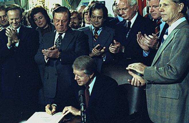 Jimmy Carter signs Airline Deregulation Act