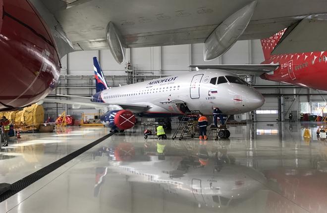 :: ATO.ru самолет Superjet 100 авиакомпании "Аэрофлот" в ангаре компании "А-Техникс" в Шереметьево