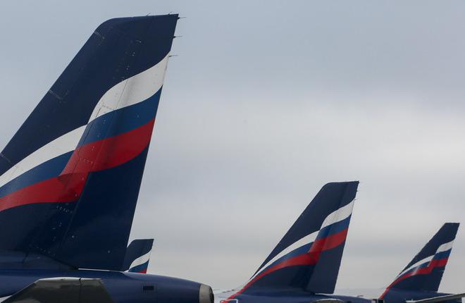 В 2021 году флот группы "Аэрофлот" должен достичь 380 самолетов :: Леонид Фаерберг // transport-photo.com Хвосты самолетов авиакомпании "Аэрофлот"
