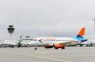 Самолет Superjet 100 авиакомпании "Азимут" в аэропорту Мюнхена